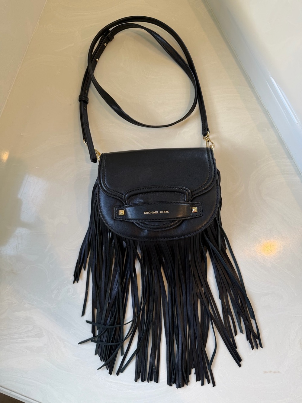 Michael Kors Black Leather Fringe Crossbody Bag with Gold Accents
